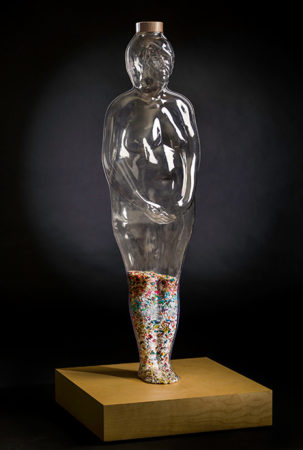 "Part D," by Pamela DeTuncq. As part of the Aging Project, this sculpture addresses the issue of the over-medication of our country's elderly. It's title 'Part D' refers to the section of Medicare covering prescription drugs. This life-sized figure containing prescription medication calls attention to the pharmaceutical industry's far-reaching influence.