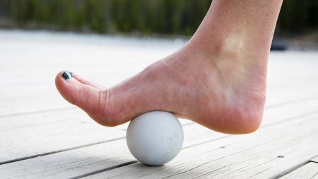 Rolling ball under arch of foot