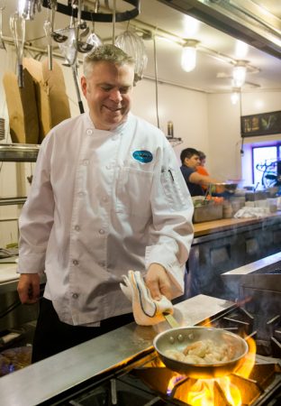 Doug Jensen, executive chef at Sawtooth Brewery Public House, makes citrus grilled shrimp