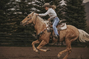 Cowgirl riding a horse